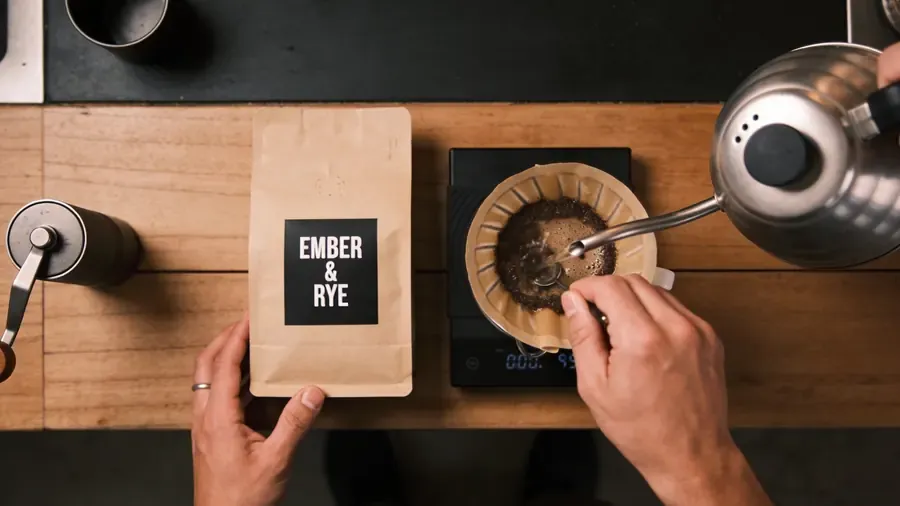 Tutorial: a creator showing an Ember & Rye coffee bag